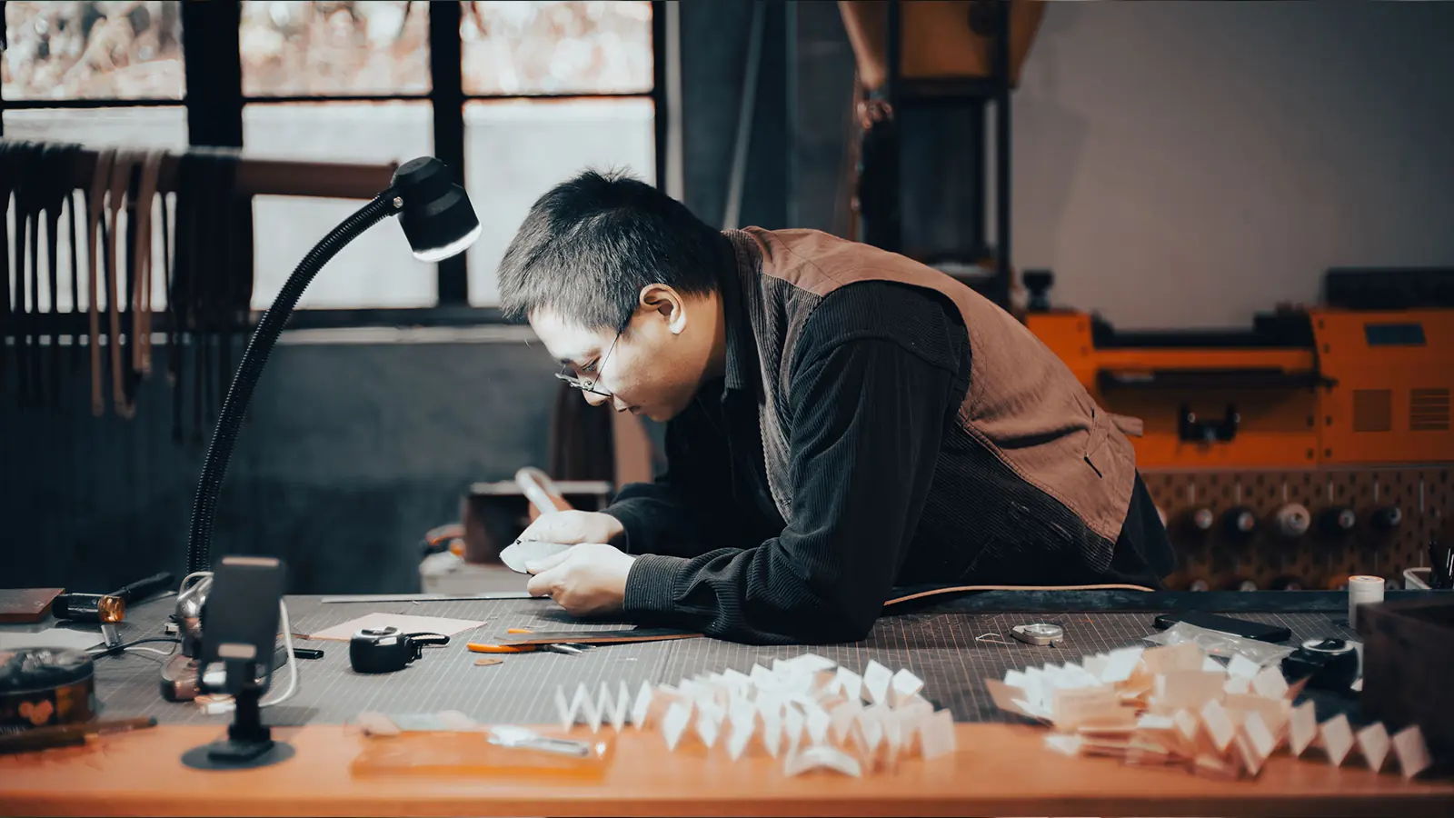 Ceramic and building materials sourcing from China: glaze and shade checked under task lighting