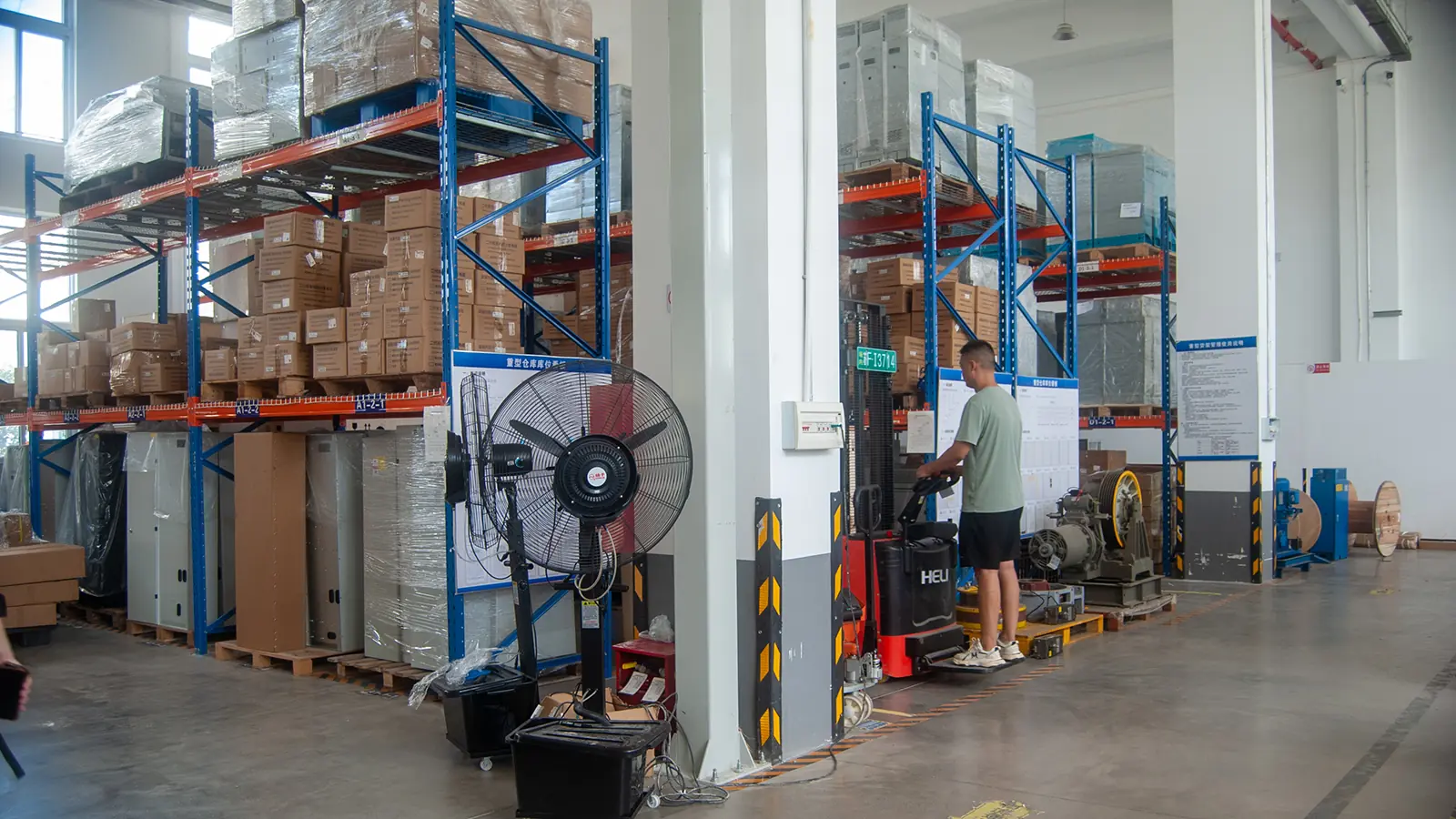 Chinese New Year factory shutdown: finished goods staged in a supplier warehouse before the break